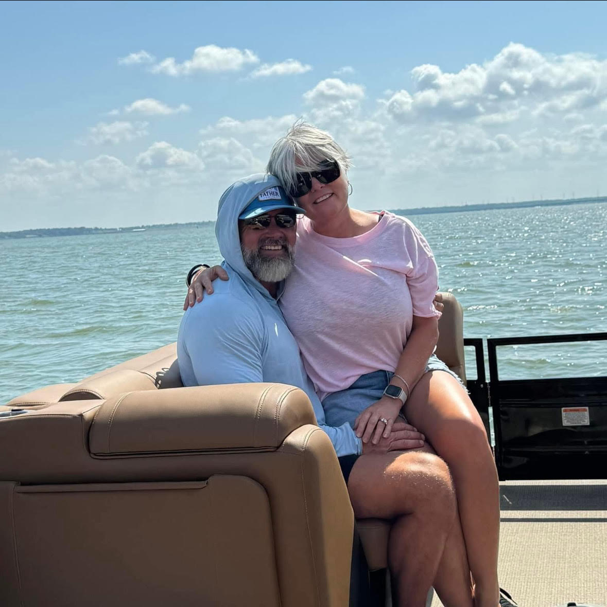 Donny and Kathy Rice on a boat at the lake